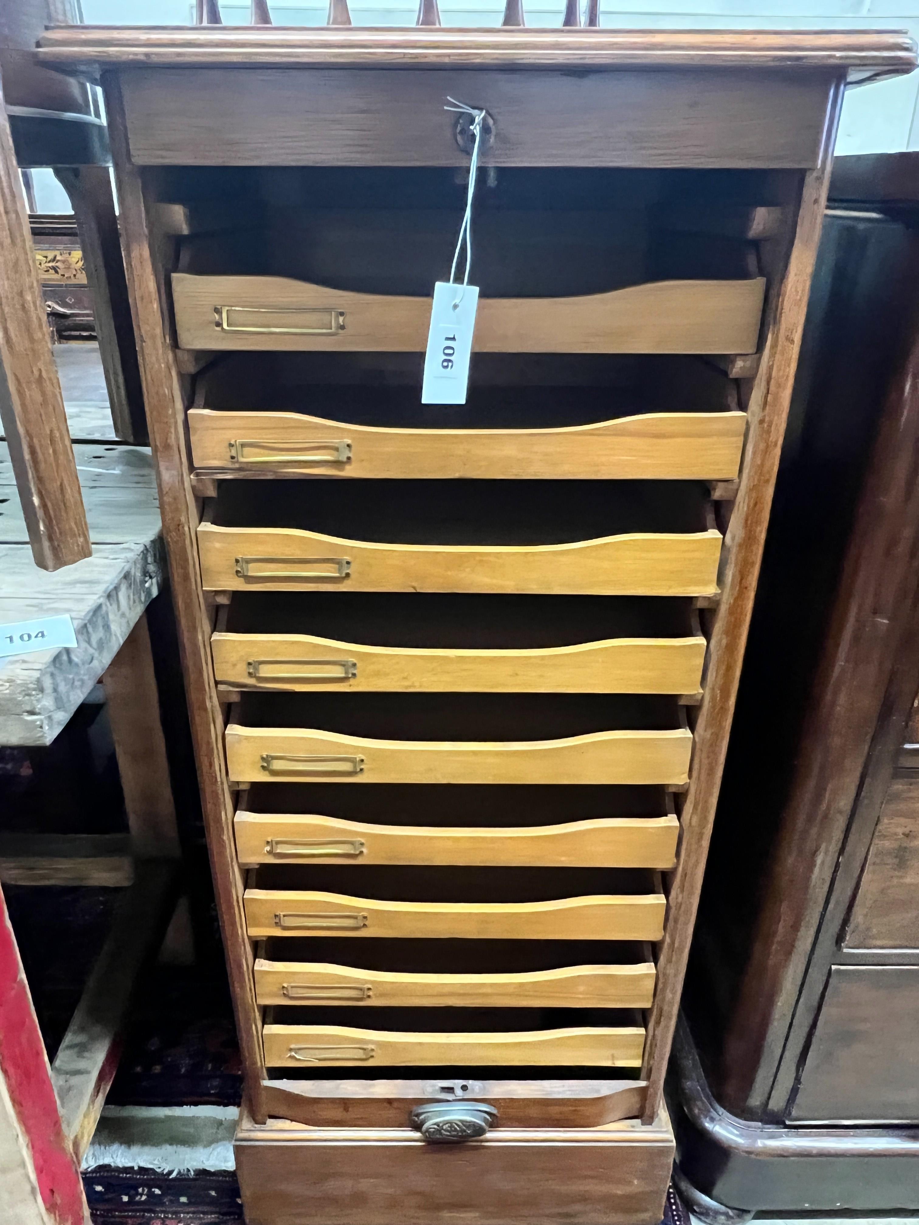 An early 20th century oak tambour filing cabinet, width 50cm, depth 42cm, height 115cm